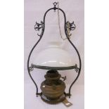 A large Veritas Lampe pendant oil lamp, with opaque glass shade and ornate hanger with scrolling