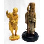 A 4¾" Oriental soapstone figure of the God of Fortune Fukurokuju with his staff and holding a