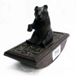 A Black Forest wooden blotter with carved bear pattern handle