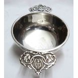 A silver quaich with decorative pierced handles - Chester marks worn