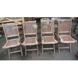 A set of four teak folding garden chairs with slatted seats and backs