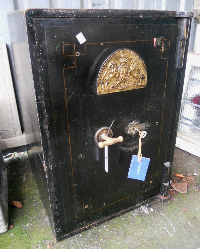 A Victorian steel plate safe with painted finish, gilt metal plaque bearing royal cipher and Her