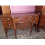 An Edwardian mahogany & satinwood sideboard with half-cylinder tambour drawer by Thomas Varley of