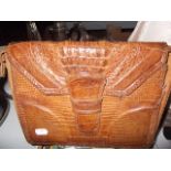 A crocodile skin handbag