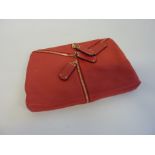 BASTYAN, a ladies red leather clutch handbag