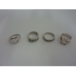 FOUR RINGS, two Hot Diamonds rings, together with a pearl ring and a cubic zirconia dress ring (4)