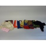 A COLLECTION OF VINTAGE SCARVES, gloves and stockings