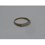 A 9CT GOLD FIVE STONE DIAMOND RING, hall