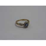 A 9CT GOLD SAPPHIRE AND DIAMOND CLUSTER RING, ring size K