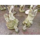 TWO CONCRETE GARDEN FIGURES, and two small garden gnomes (4)