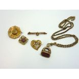 A COLLECTION OF VICTORIAN AND EDWARDIAN JEWELLERY, to include three brooches, a pendant and a