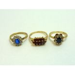 THREE RINGS, to include two 9ct gold cluster rings together with a further ring