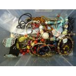 A TUB OF COSTUME JEWELLERY