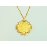 A SOVEREIGN PENDANT NECKLACE, the full sovereign dated 1900 within a 9ct gold fancy surround to