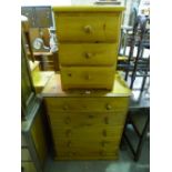 A PINE CHEST OF FIVE LONG DRAWERS, and a three drawer bedside chest (2)