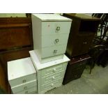 TWO CHESTS OF THREE DRAWERS, a pair of bedside chests, pot cupboard and a hall table (6)