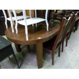 A DARKWOOD DINING TABLE