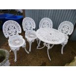 A CIRCULAR ALUMINIUM GARDEN TABLE, and four chairs (5)