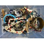 A TUB OF COSTUME JEWELLERY