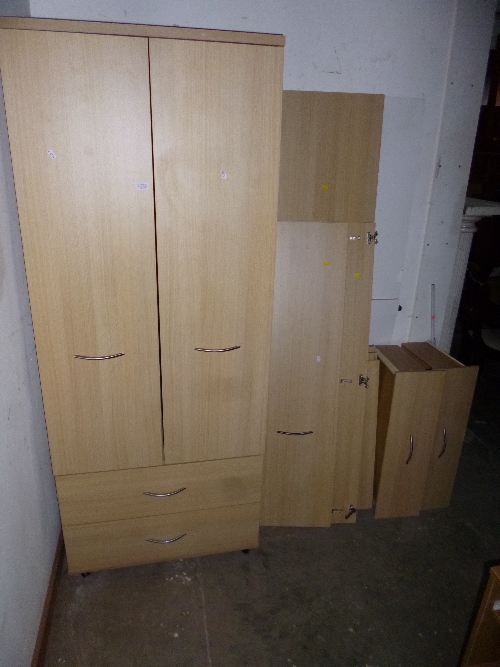 TWO MODERN TWO DOOR WARDROBES, both with two drawers to the base