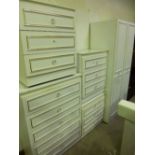 A MODERN FIVE PIECE BEDROOM SUITE, comprising of a two door wardrobe and four various chests of