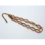 A VICTORIAN ROSE GOLD BRACELET, with each link stamped .375, length 20cm (s.d.)