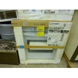 AN INDESIT INTEGRATED GAS OVEN, (in original packaging)