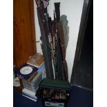 A LARGE QUANTITY OF FISHING RODS, REELS, FLOATS, UMBRELLA, etc, (Mitchell, Shakespeare Reels etc)