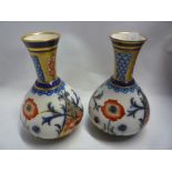 A PAIR OF MACINTYRE MOORCROFT VASES, Poppy and Foliage design, M428, height approximately 14cm