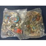 TWO BAGS OF COSTUME JEWELLERY