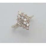 A DIAMOND RING, of kite shape with brilliant cut diamonds to the plain tapered band, estimated total