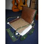 A CHILDS PUSH/PULL ALONG SEAT, with a G.W.R. Locomotive book (2)