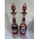 A PAIR OF LATE 19TH CENTURY RUBY WASH DECANTERS, decorated with grapes (2)
