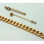 THREE ITEMS OF JEWELLERY, to include a 9ct rose gold curb link bracelet, together with two stick