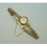 A 9CT GOLD LADIES ROTARY WATCH