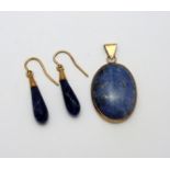 A 9CT PENDANT AND EARRINGS, of oval shape with lapis lazuli together with a pair of lapis lazuli