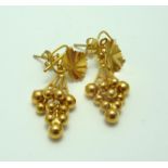 A PAIR OF EARRINGS, stylised as a bunch of moving hanging grapes to the twisted vine leaf stud and