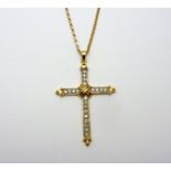 A 9CT GOLD DIAMOND CRUCIFIX PENDANT, of bi-colour design, estimated total diamond weight 0.40cts,