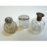 THREE GLASS AND SILVER DRESSING TABLE SCENT BOTTLES, circa 1900-1920, varionoly decorated (3)