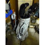 A PING GOLF BAG, a quantity of clubs and another golf bag