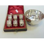 A CASED SET OF VICTORIAN REPOUSSE NAPKIN RINGS, Birmingham 1897, approximate weight 2.4 troy oz,