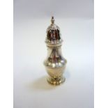 A SILVER BALUSTER SHAPE SUGAR SIFTER, Birmingham 1937, approximately 2.5 troy oz
