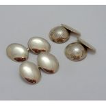 TWO PAIRS OF WHITE METAL CUFFLINKS, the first a plain pair of oval shape cufflinks together with a