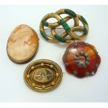 FOUR VICTORIAN BROOCHES, to include a shell cameo of a woman in profile, an agate brooch, a