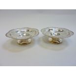 A PAIR OF SILVER TAZZA, Chester 1916, of lobed shape with moulded and openwork rims, 21cm