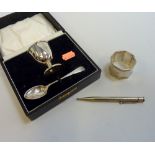 A SILVER CHRISTENING SET, Birmingham 1933, comprising an egg cup and spoon engraved 'Pamela' to a