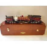 A WOODEN PRESENTATION CASE CONTAINING A L.G.B/ASTER G SCALE BEYER-GARRATT NGG13 LOCOMOTIVE,