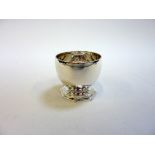 A SILVER CUP, Sheffield 1938, of Art Deco Ogee shape with octagonal foot, 6cm high, approximately
