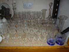 VARIOUS ETCHED GLASSES, two cut glass decanters, a pair of vases with plated bases etc