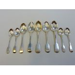 A GROUP OF VICTORIAN SILVER 'FIDDLE' PATTERN SPOONS, four dessert and four tea spoons, together with